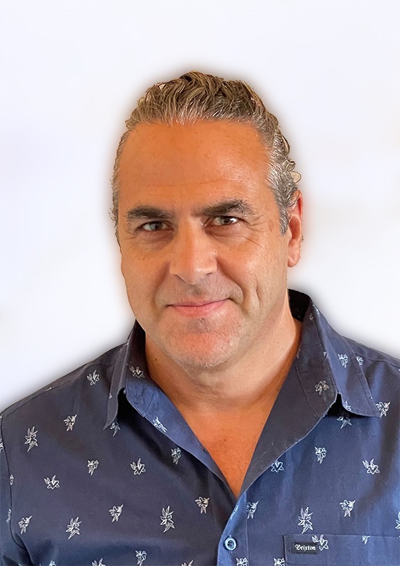 Photo of a man in a blue shirt
